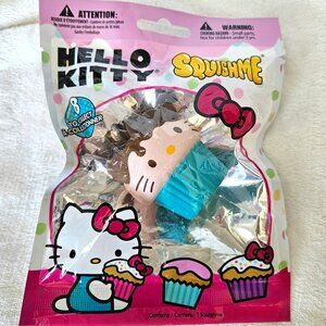 New Sanrio Hello Kitty Squishme Chocolate Icing with Blue Wrapper